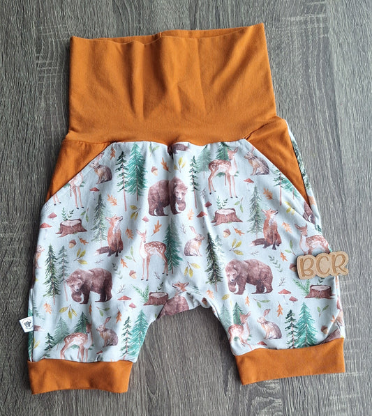 Grow with me shorts with foxes, bears, deer and rabbits on. Featuring fold over waistband and pockets. 