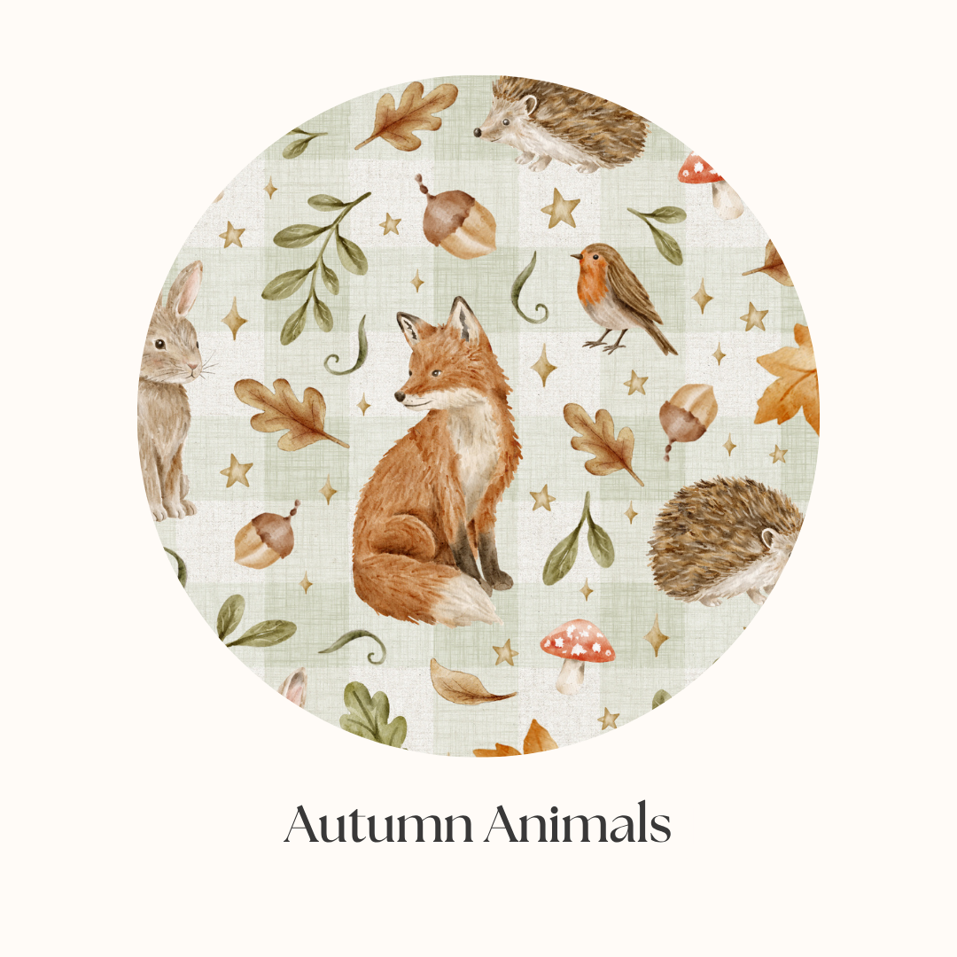 organic cotton fabric with foxes, robins, rabbits and hedgehogs.